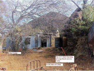 Illustration for article titled Buy This Cabin—And Get Its Secret Treasure Tunnels Free
